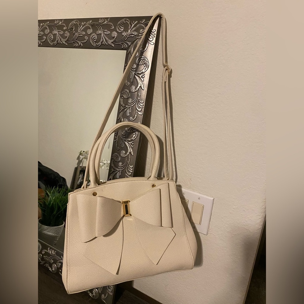 NWOT Crossi beige with gold handbag. New. Classy and elegant!